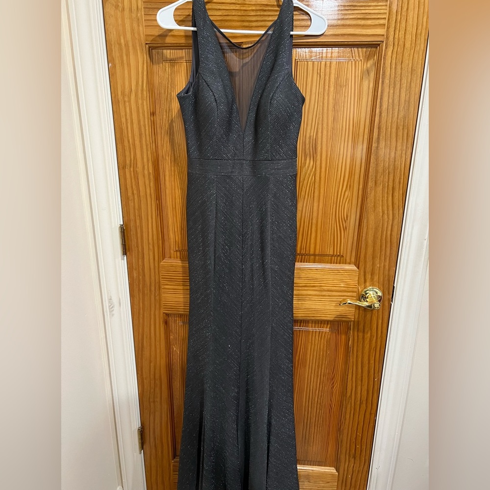 Floor length dark grey/ shimmery formal gown.